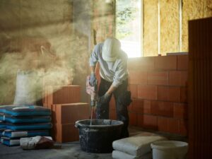 Bricklayer mixing cement+1